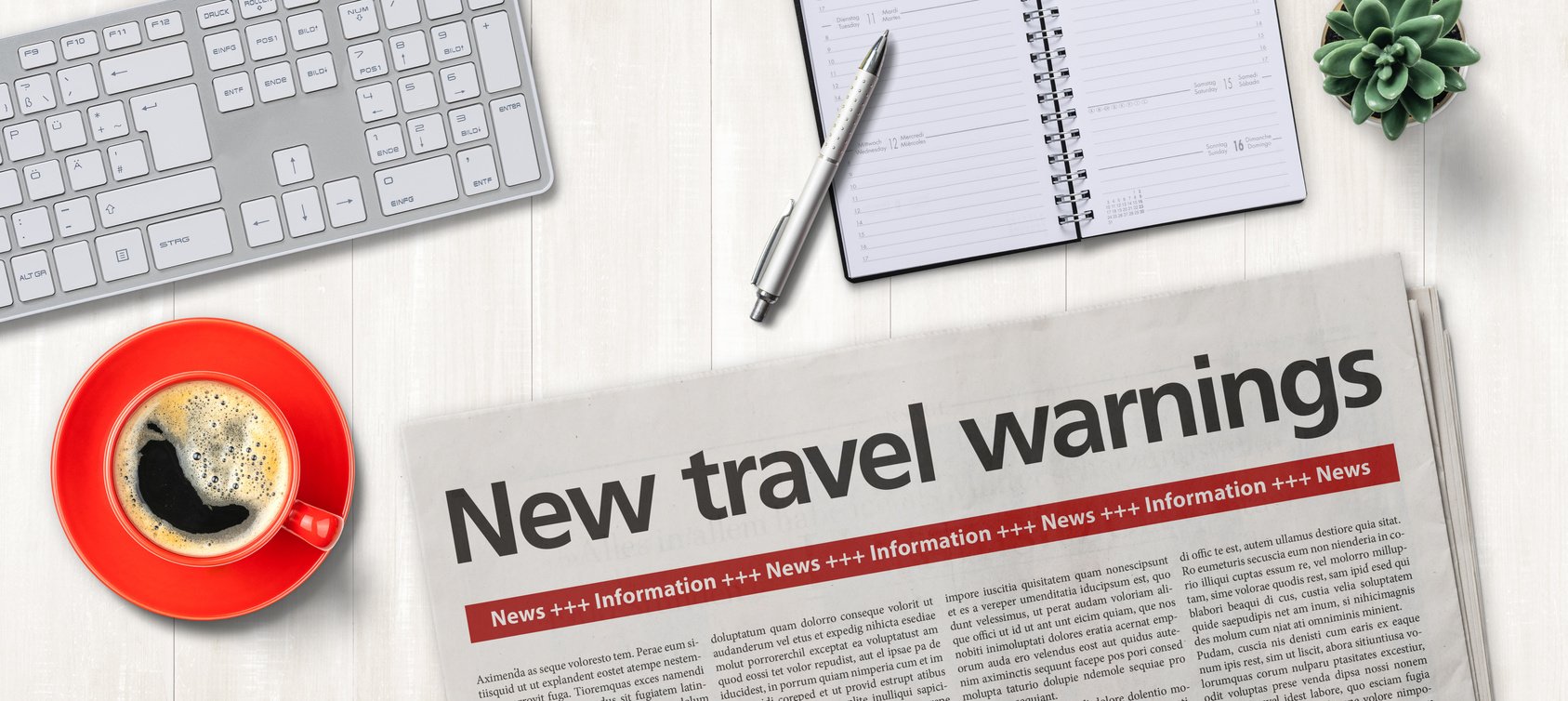 Newspaper With Travel Warnings Headline